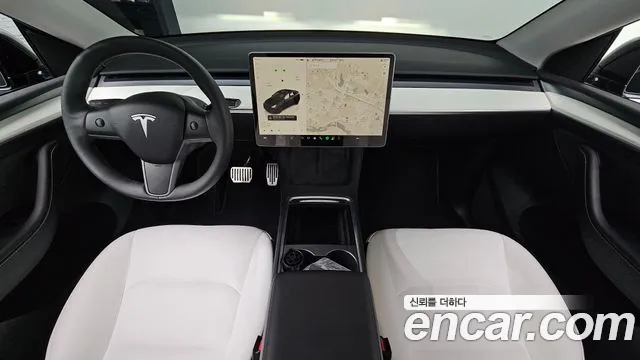 Tesla Model Y — Фото автомобиля 10