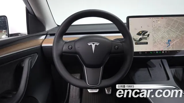 Tesla Model Y — Фото автомобиля 13