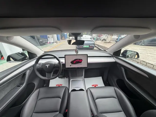 Tesla Model Y — Фото автомобиля 7