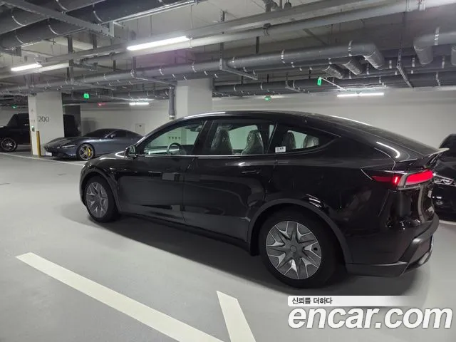 Tesla Model Y — Фото автомобиля 2