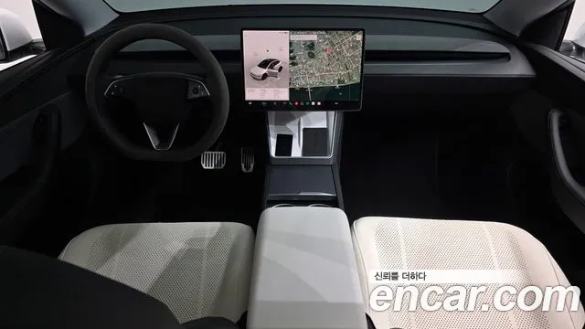 Tesla Model Y — Фото автомобиля 7