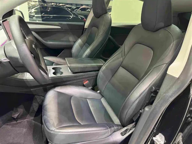 Tesla Model Y — Фото автомобиля 21