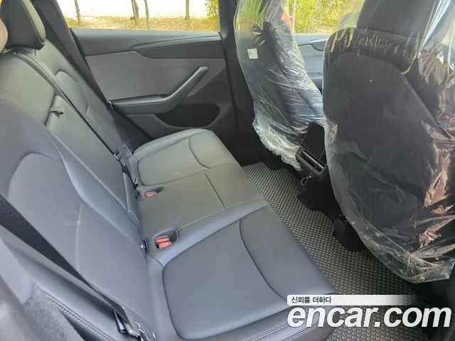 Tesla Model Y — Фото автомобиля 14