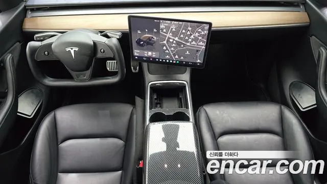 Tesla Model Y — Фото автомобиля 7