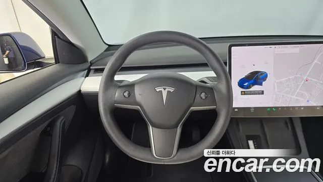Tesla Model 3 — Фото автомобиля 12