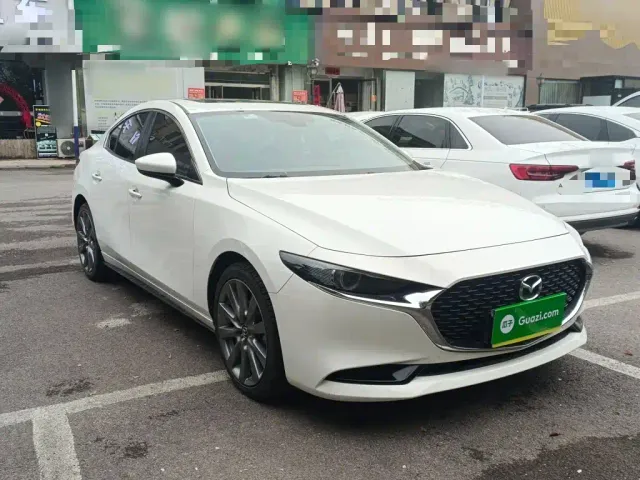 Mazda Axela — Фото автомобиля 21