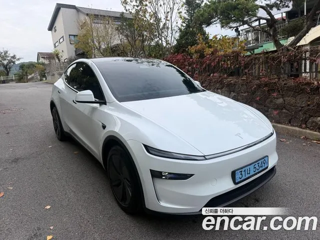 Tesla Model Y — Фото автомобиля 3