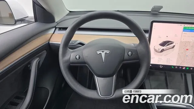 Tesla Model 3 — Фото автомобиля 12