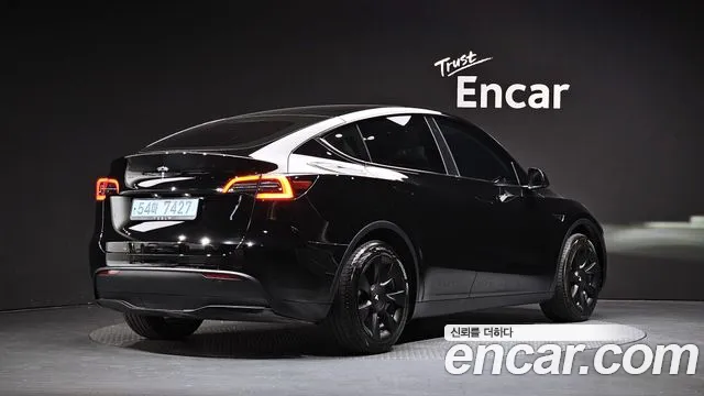 Tesla Model Y — Фото автомобиля 2