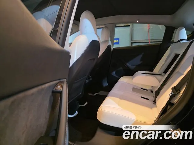 Tesla Model Y — Фото автомобиля 9