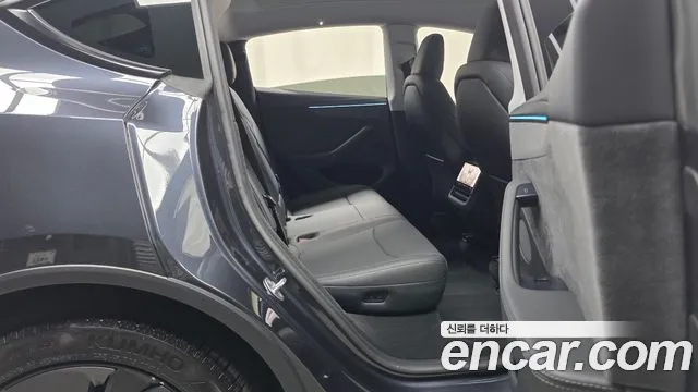 Tesla Model Y — Фото автомобиля 16