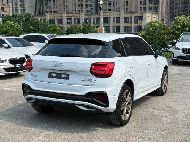 Audi Q2L — Фото автомобиля 9