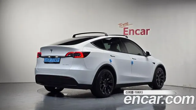 Tesla Model Y — Фото автомобиля 2