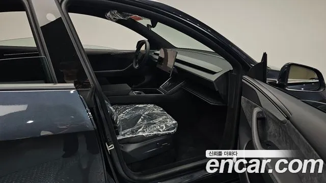Tesla Model Y — Фото автомобиля 10
