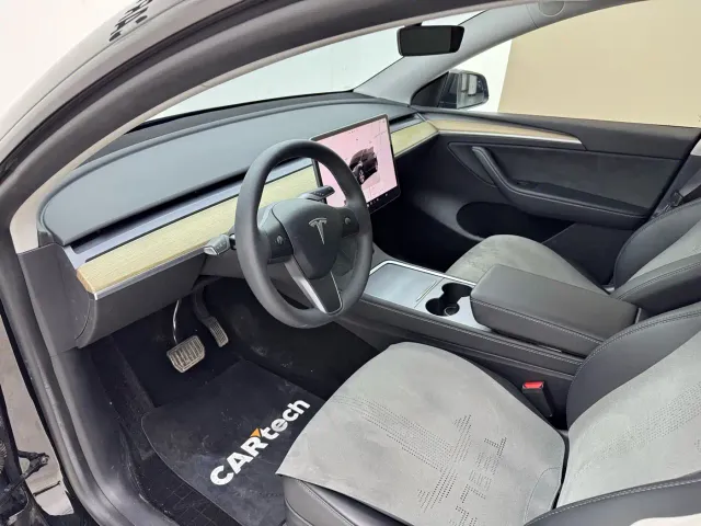 Tesla Model Y — Фото автомобиля 10