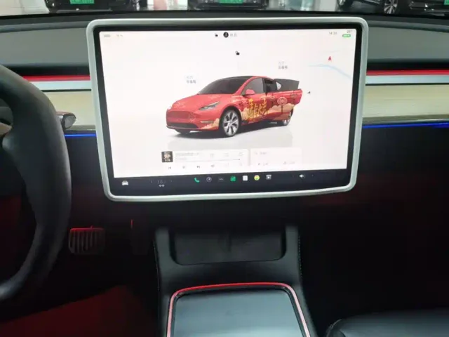 Tesla Model Y — Фото автомобиля 12