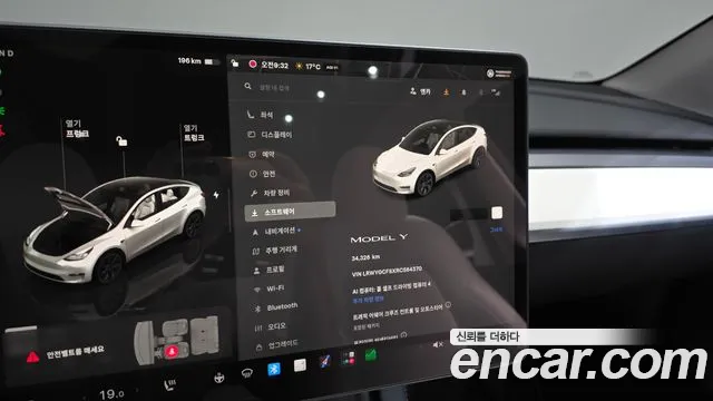 Tesla Model Y — Фото автомобиля 11