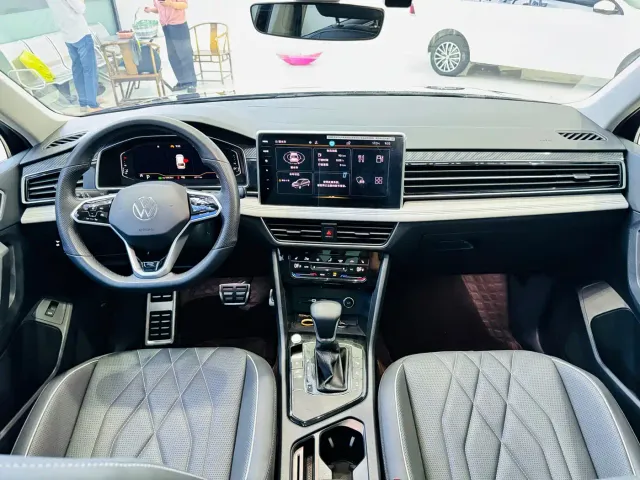 Volkswagen Tiguan L — Фото автомобиля 10