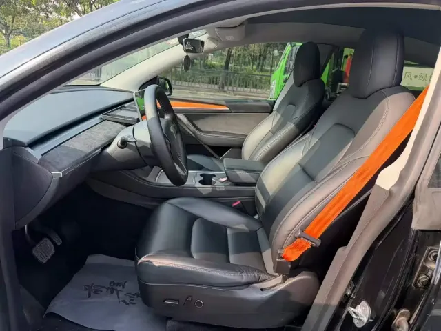 Tesla Model Y — Фото автомобиля 6