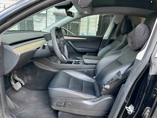 Tesla Model Y — Фото автомобиля 10