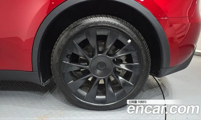 Tesla Model Y — Фото автомобиля 6