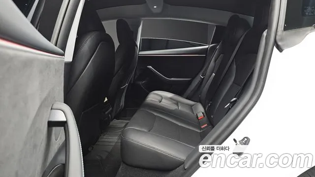Tesla Model 3 — Фото автомобиля 11
