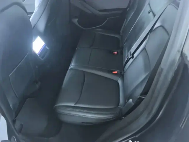 Tesla Model Y — Фото автомобиля 16