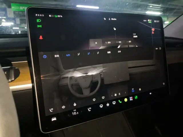 Tesla Model Y — Фото автомобиля 12