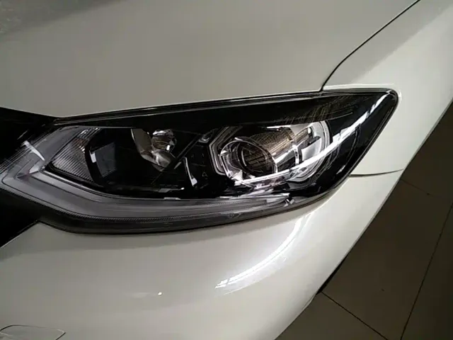 Nissan Tiida — Фото автомобиля 23