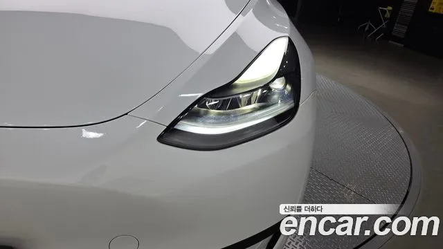 Tesla Model Y — Фото автомобиля 7