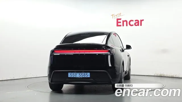 Tesla Model Y — Фото автомобиля 4