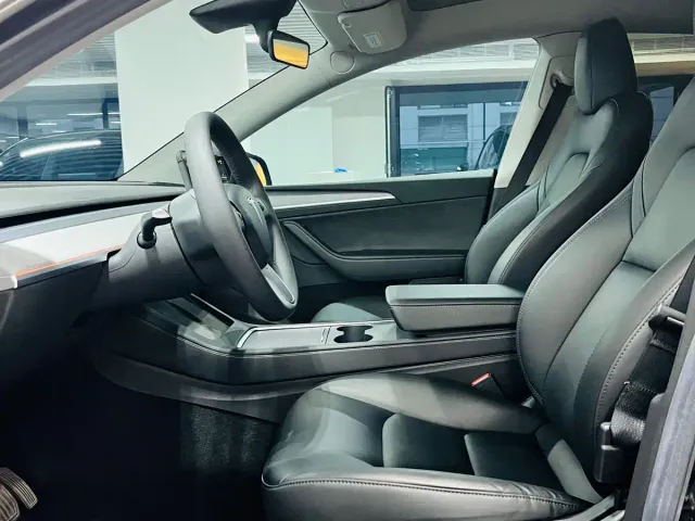 Tesla Model Y — Фото автомобиля 7