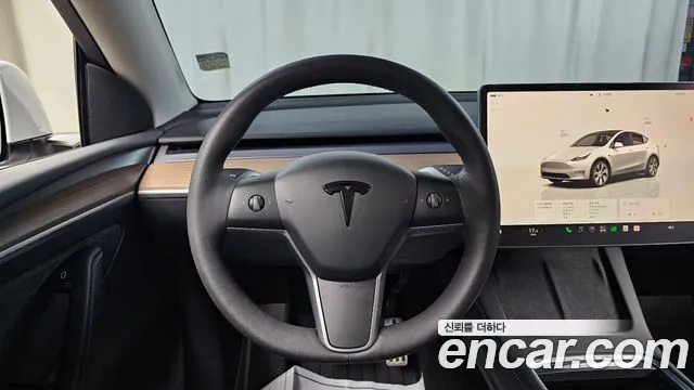 Tesla Model Y — Фото автомобиля 20