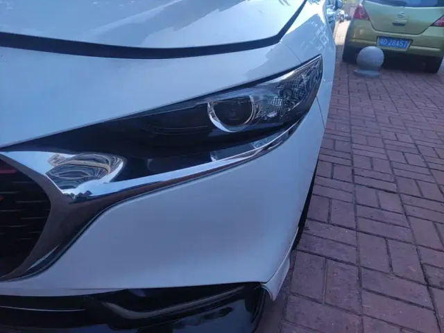 Mazda Axela — Фото автомобиля 23