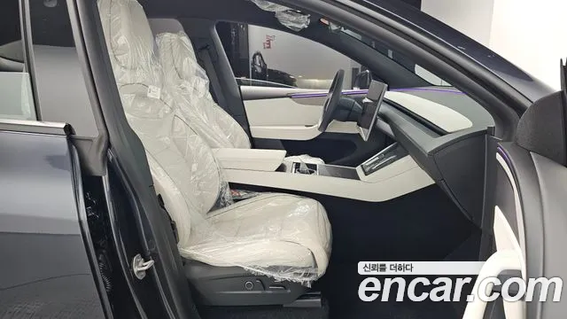 Tesla Model Y — Фото автомобиля 26