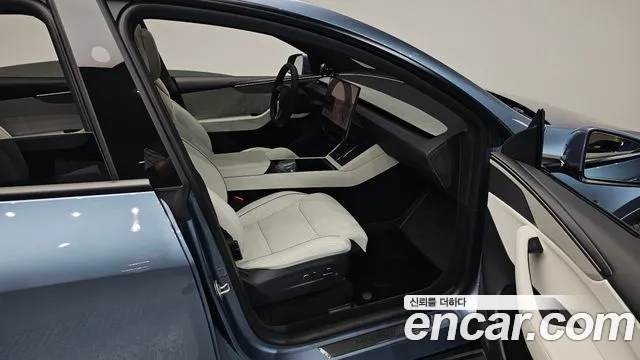 Tesla Model Y — Фото автомобиля 10