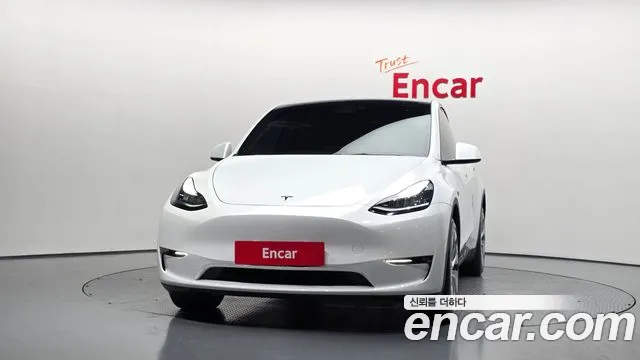Tesla Model Y — Фото автомобиля 3