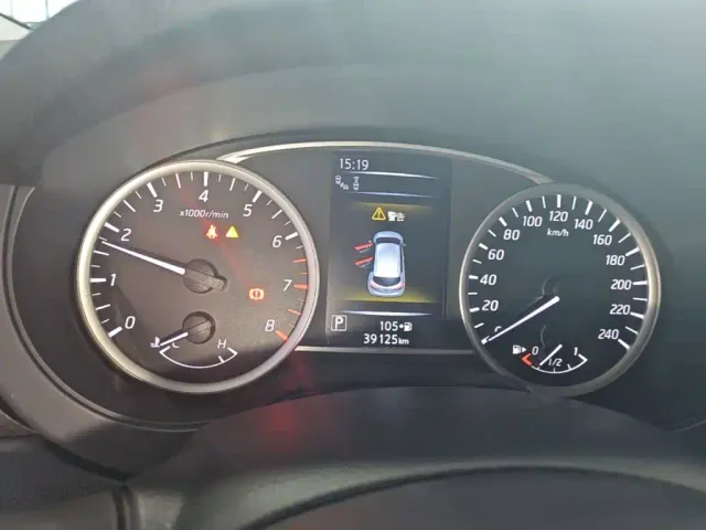 Nissan Tiida — Фото автомобиля 11