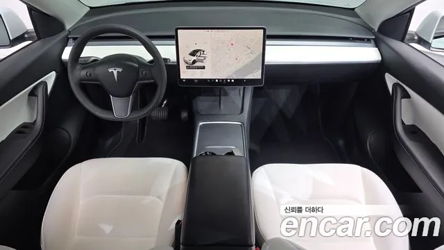 Tesla Model Y — Фото автомобиля 10