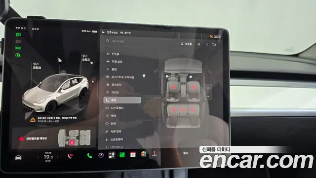 Tesla Model Y — Фото автомобиля 24