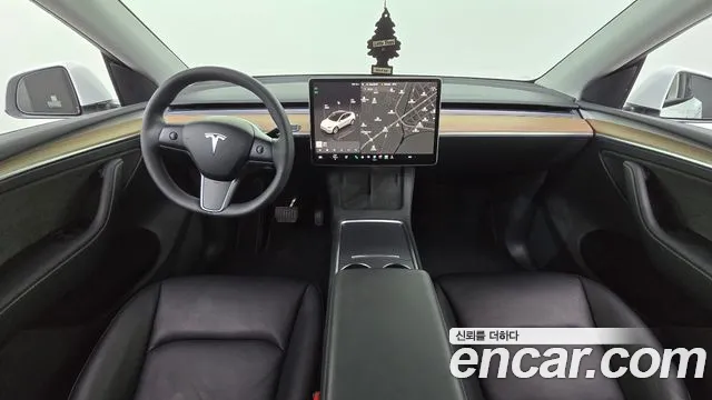 Tesla Model Y — Фото автомобиля 7