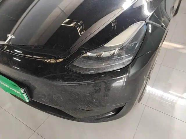 Tesla Model Y — Фото автомобиля 23
