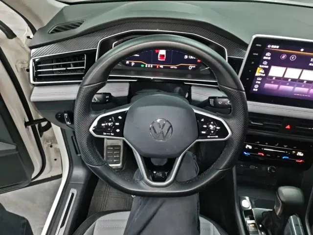 Volkswagen Tiguan X — Фото автомобиля 10