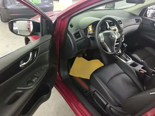 Nissan Tiida — Фото автомобиля 15