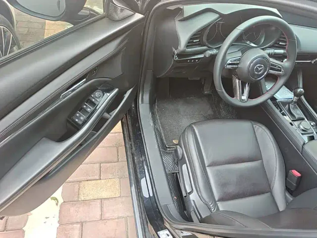 Mazda Axela — Фото автомобиля 15
