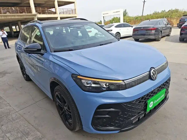 Volkswagen Tiguan L — Фото автомобиля 3