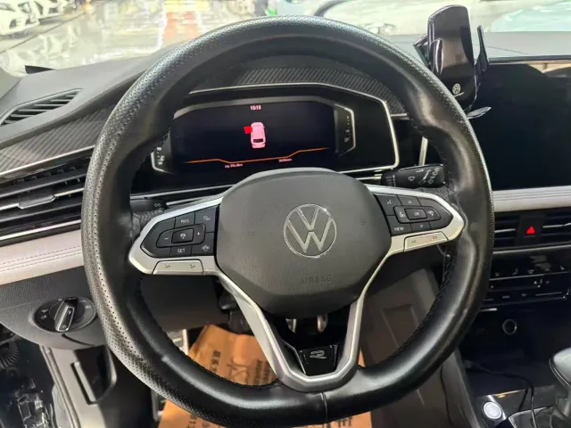 Volkswagen Tiguan L — Фото автомобиля 8