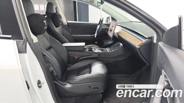 Tesla Model Y — Фото автомобиля 18