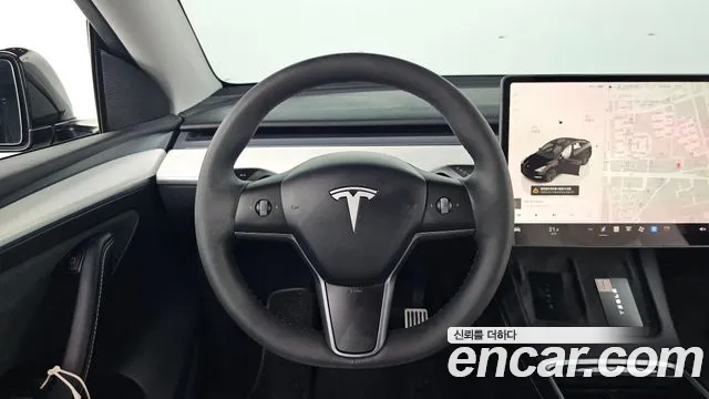 Tesla Model Y — Фото автомобиля 11