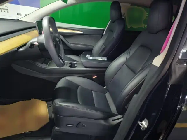 Tesla Model Y — Фото автомобиля 14